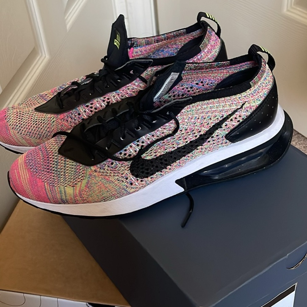 Nike Women's Pink and Black Flyknit Sneakers